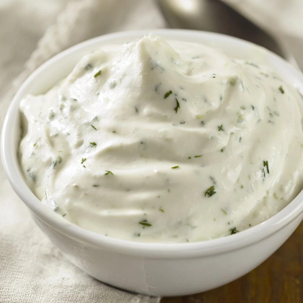 Smooth and tangy Creamy Herb Dressing served as a dip for crisp crudités and roasted vegetables.