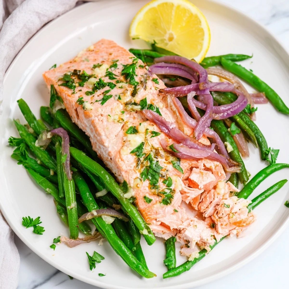 A vibrant, healthy Sheet Pan Salmon and Green Beans meal ready to serve, featuring flaky fish and bright veggies.