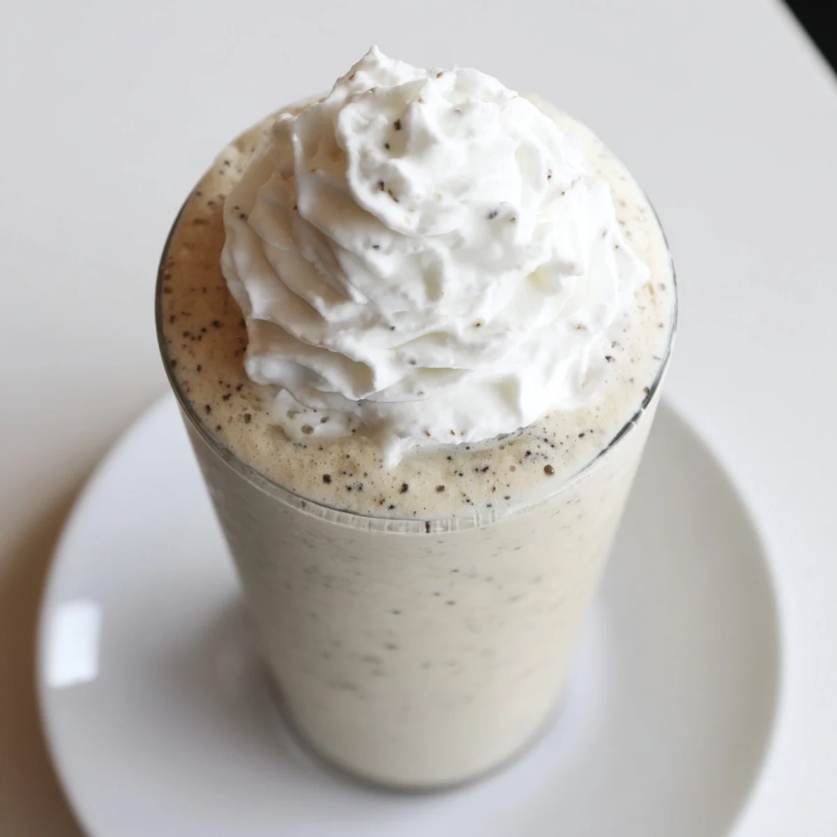 Homemade Starbucks Vanilla Bean Frappuccino recipe served chilled, featuring a creamy vanilla flavor and optional whipped cream topping.