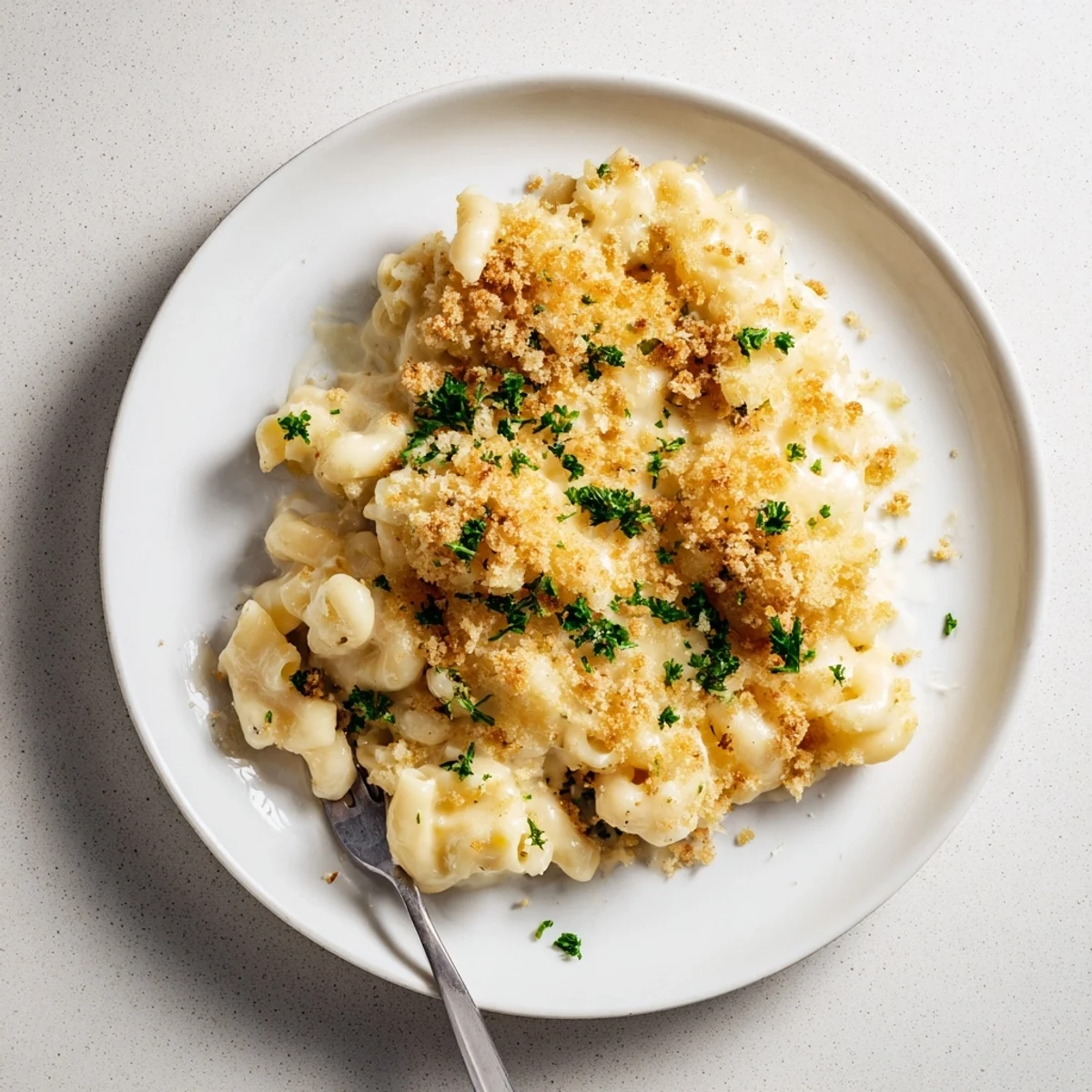 A close-up shows a spoon lifting gooey, cheesy Baked Mac and Cheese with a golden crust.