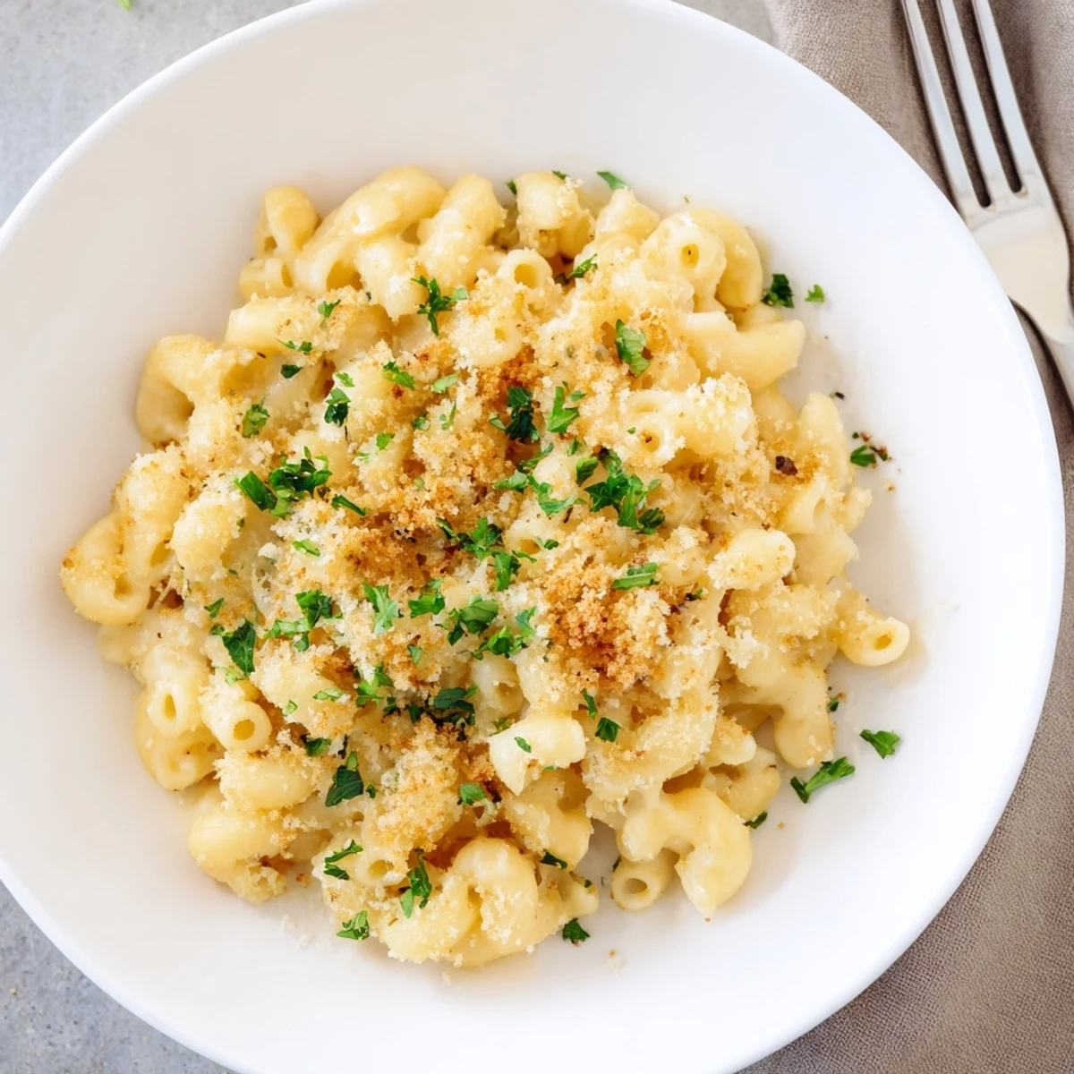 Baked Mac and Cheese is ready to serve, garnished with fresh parsley for a comforting family meal.