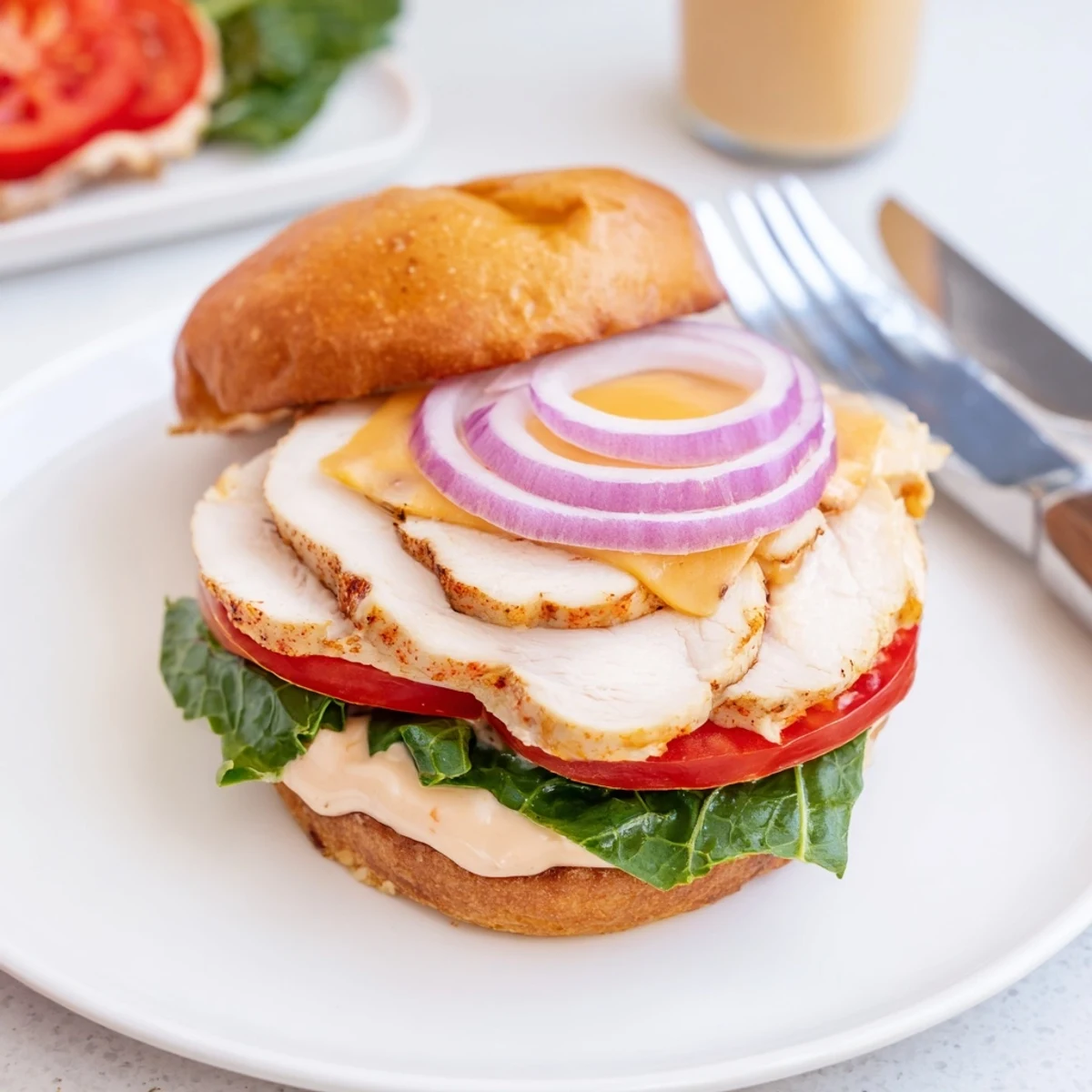 Weekend lunch: Spicy Chicken Sandwich With Creamy Sauce, crisp romaine and tomato slices